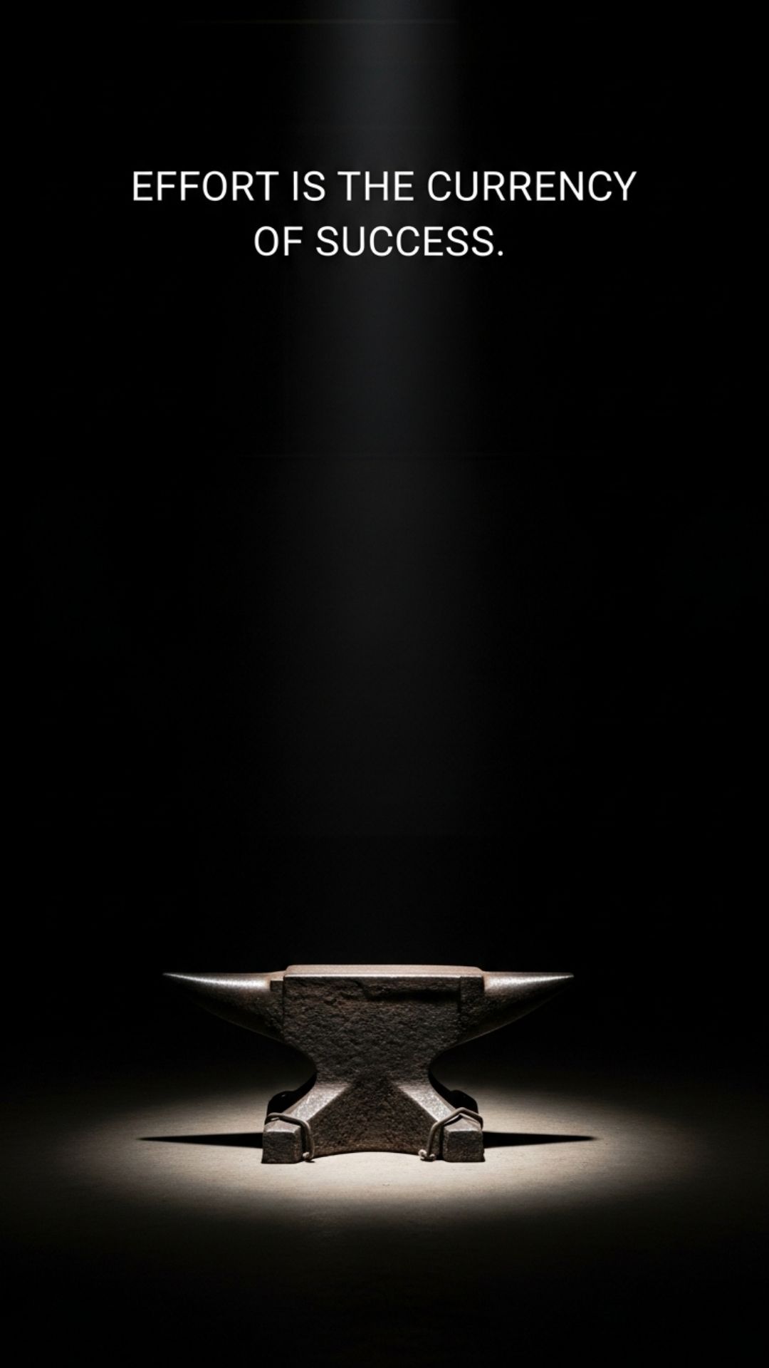 A minimalist photo of an old anvil lit by a single spotlight, with a quote about effort and success, conveying a message of hard work and determination
