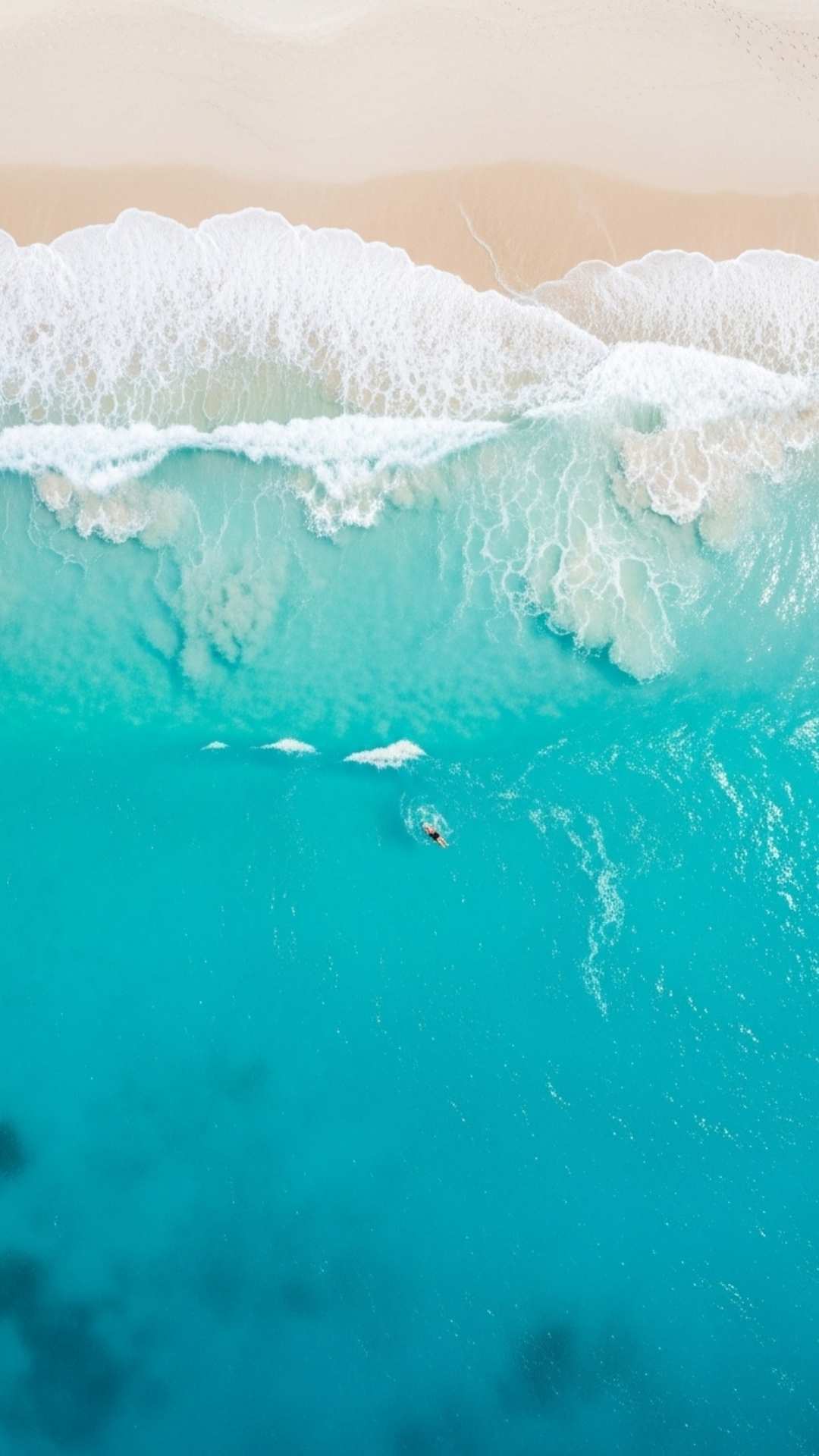 Top-down drone view Nature DP for WhatsApp featuring turquoise ocean water and white sand, symbolizing freedom and the beauty of nature.
