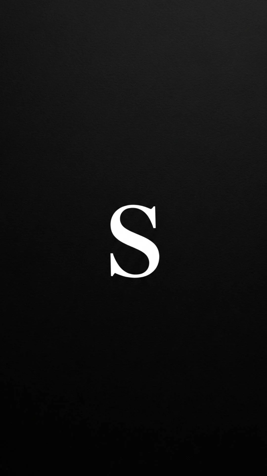 A sophisticated black S letter DP featuring a clean, minimalist white 'S' on a deep matte black textured background. This simple and elegant S name DP represents intellect and understated power, ideal for a mysterious, sad, or professional WhatsApp profile