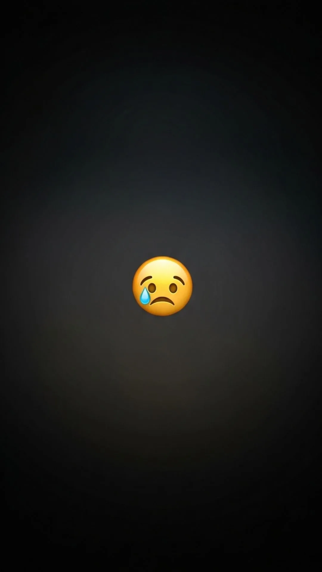 A "Sad DP" featuring a poignant yellow sad emoji on a dark, blurred background, perfect as a "Mood Off DP" or "No DP Image" for WhatsApp to subtly express sadness or feeling down.